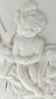 Molded putti on a fragement from possible teapot.